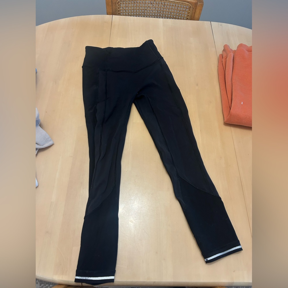 Lululemon all the right places 7/8 leggings with a small hole at the waistband